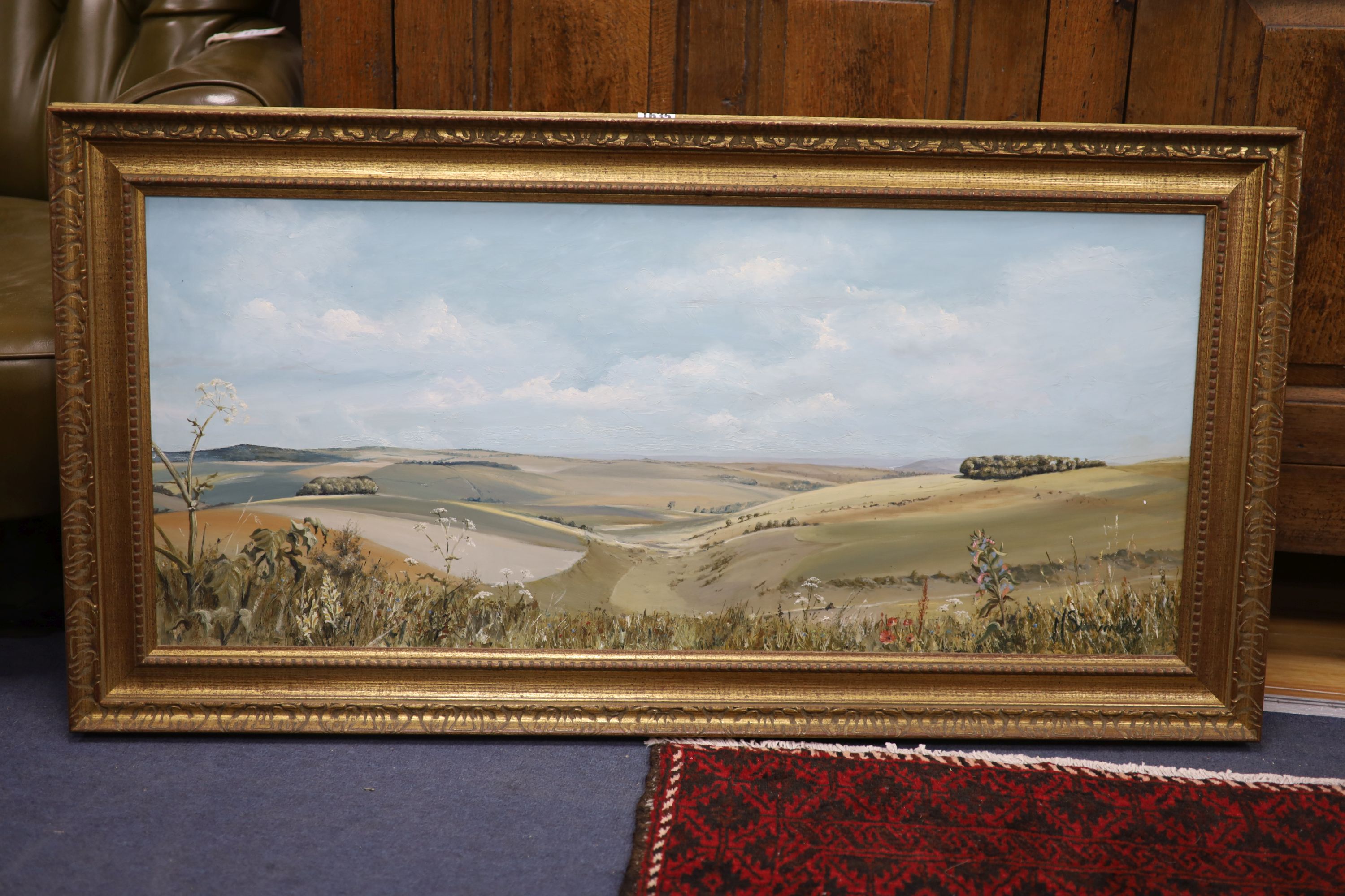 Michael Simmons, oil on board, Towards Lewes from Falmer Road, signed, 39 x 90cm